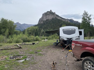 Our Dutchman Astoria at a mountain campsite in Colorado